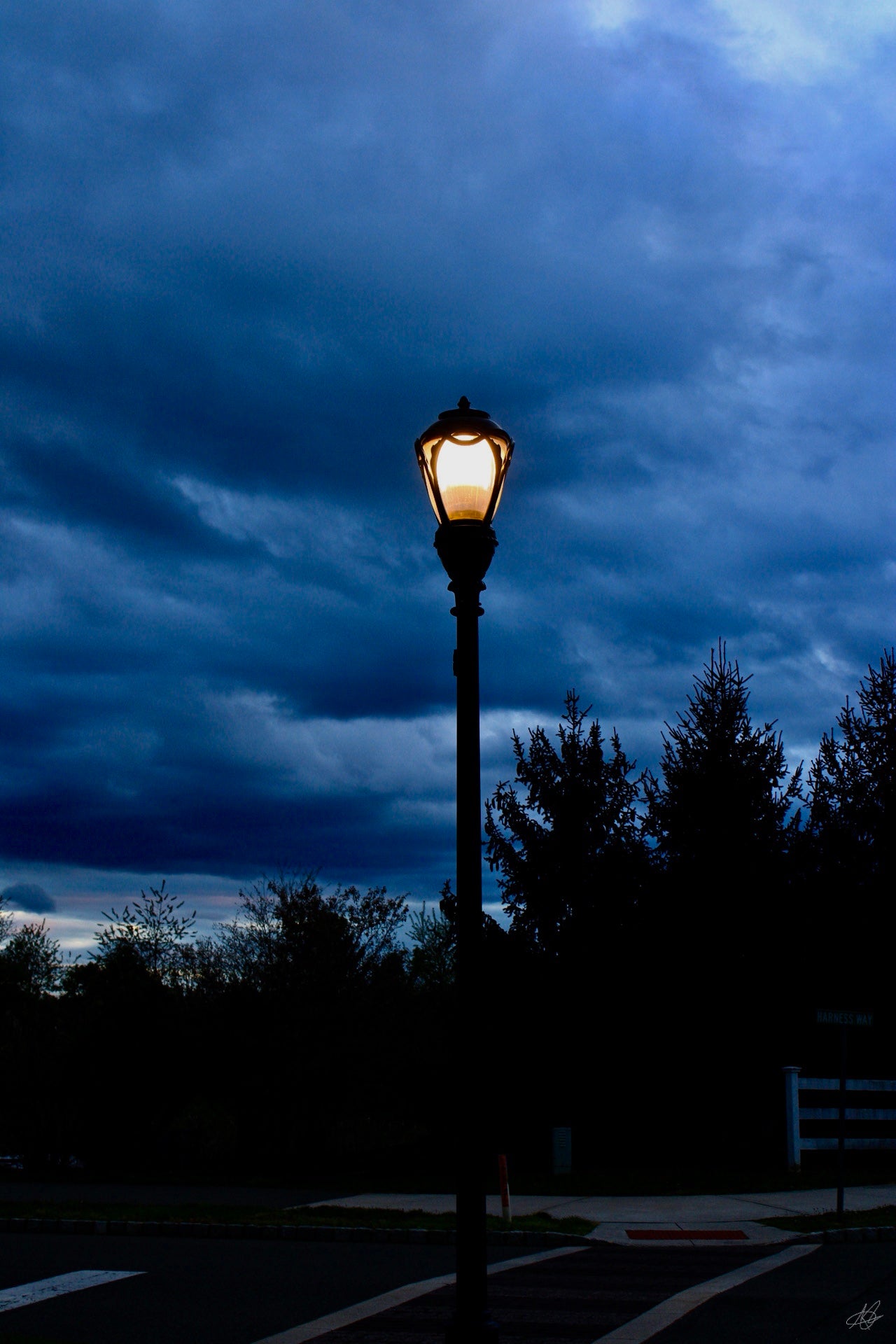Dark Nights with Spooky Clouds and a Stand-Alone Lamp Post