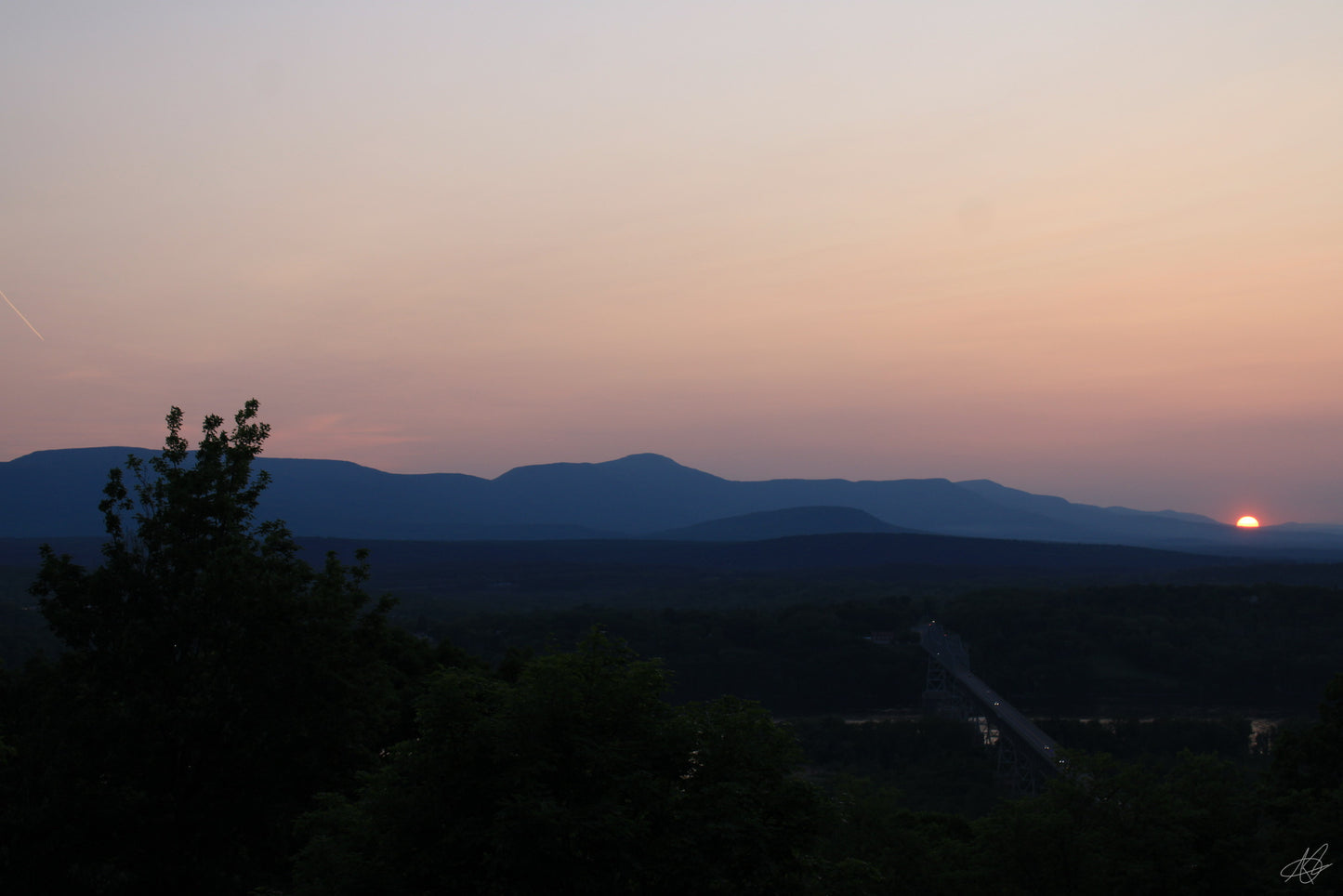 Sunset Over a Mountain Slowly Setting